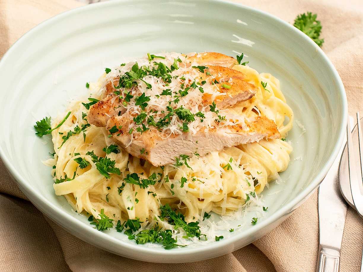 A plate of pasta alfredo